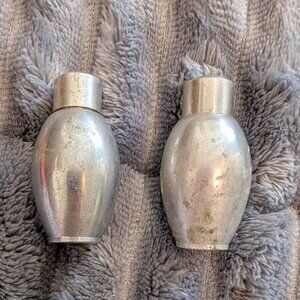 Pair of vintage metal salt and pepper shakers